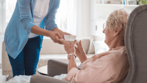 home care service provider brining a senior woman morning tea
